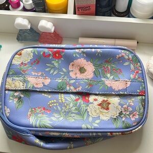 Yumi Kim makeup and travel bag with two tears. Never used.